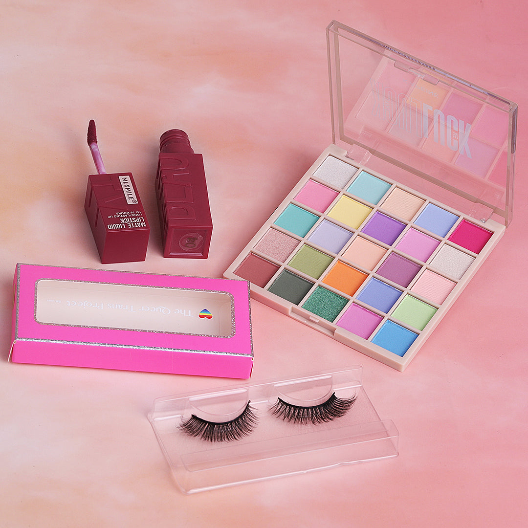 Makeup items including a colorful eyeshadow palette, lipstick, and false eyelashes, on a pink background.